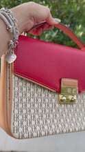 Load and play video in Gallery viewer, Pre-owned Carolina Herrera Crossbody Bag
